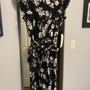 Calvin Klein flowered jumpsuit. Brand new never worn
